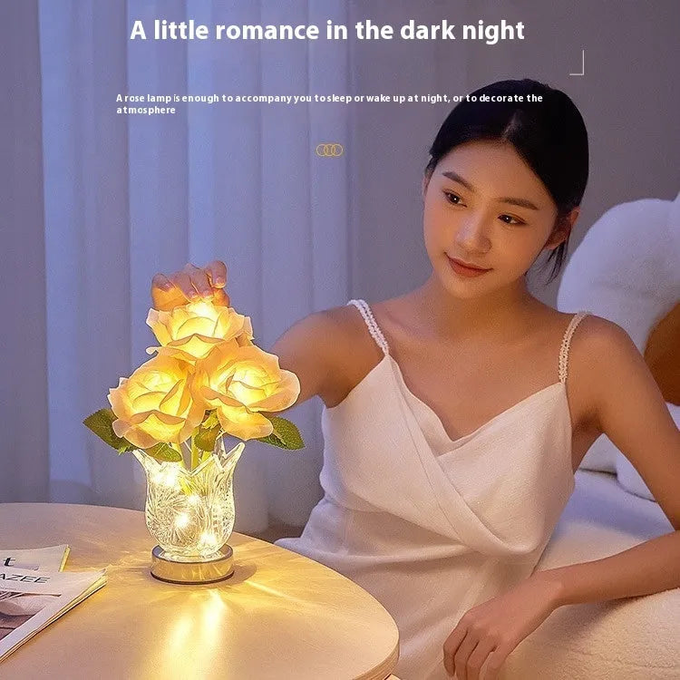 Modern crystal flowers design rechargeable touch table lamp on a bedside table.