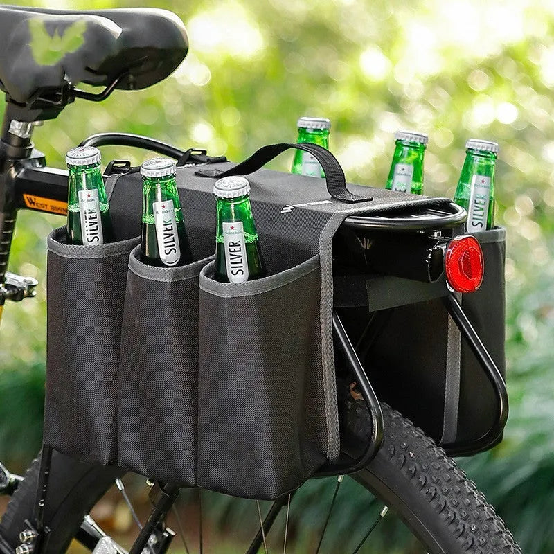 Black and orange double-sided bicycle drink bag made from 600D PVC mounted on handlebars.
