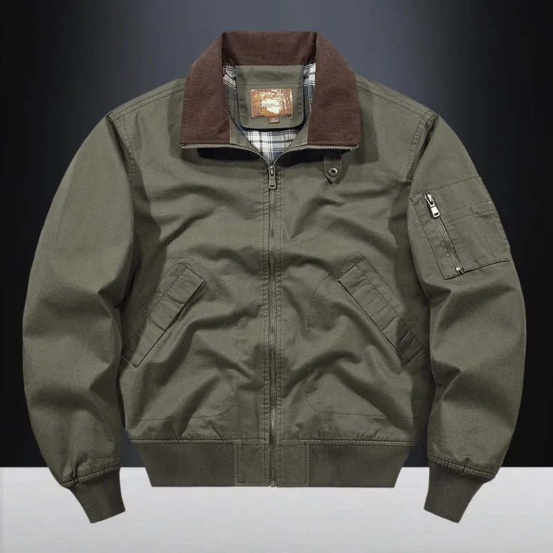 Men's camel coloured washed cotton baseball flight jacket on a hanger