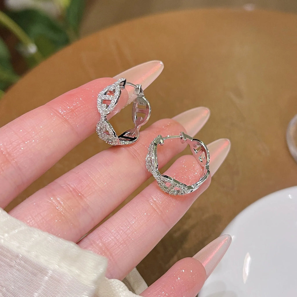 A pair of women's casual diamond-design earrings with a thick gold-plated finish in a choice of colours.