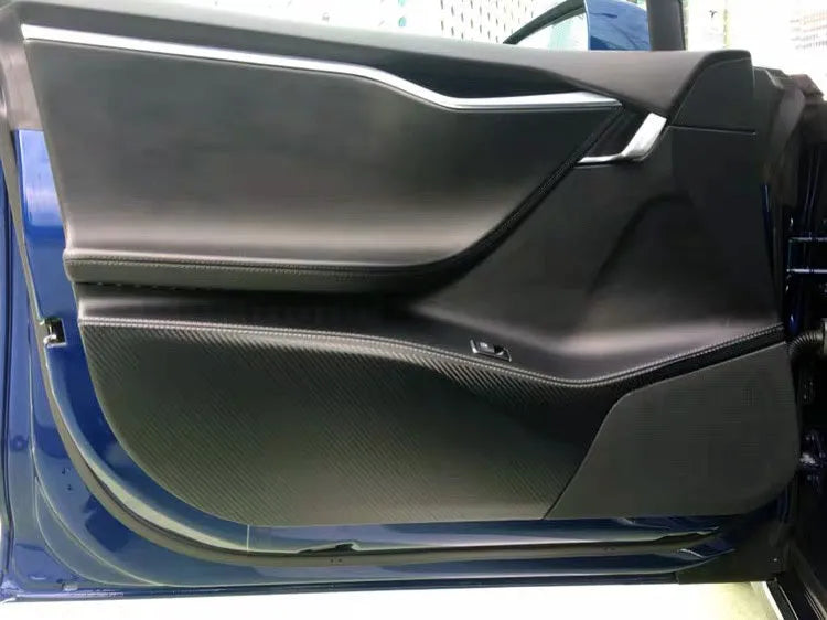 Carbon fibre pattern protective film for Tesla Model S car door interiors.