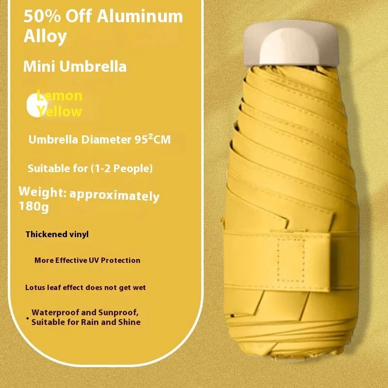 Closed five-fold manual umbrella with a gradient vinyl sunshade, showing the six-alloy-bone frame and one of eight colour options.
