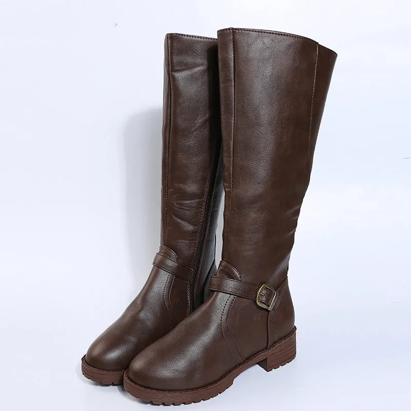 Women's black knight boots with a square heel, buckle detail on the upper, and a high shaft.