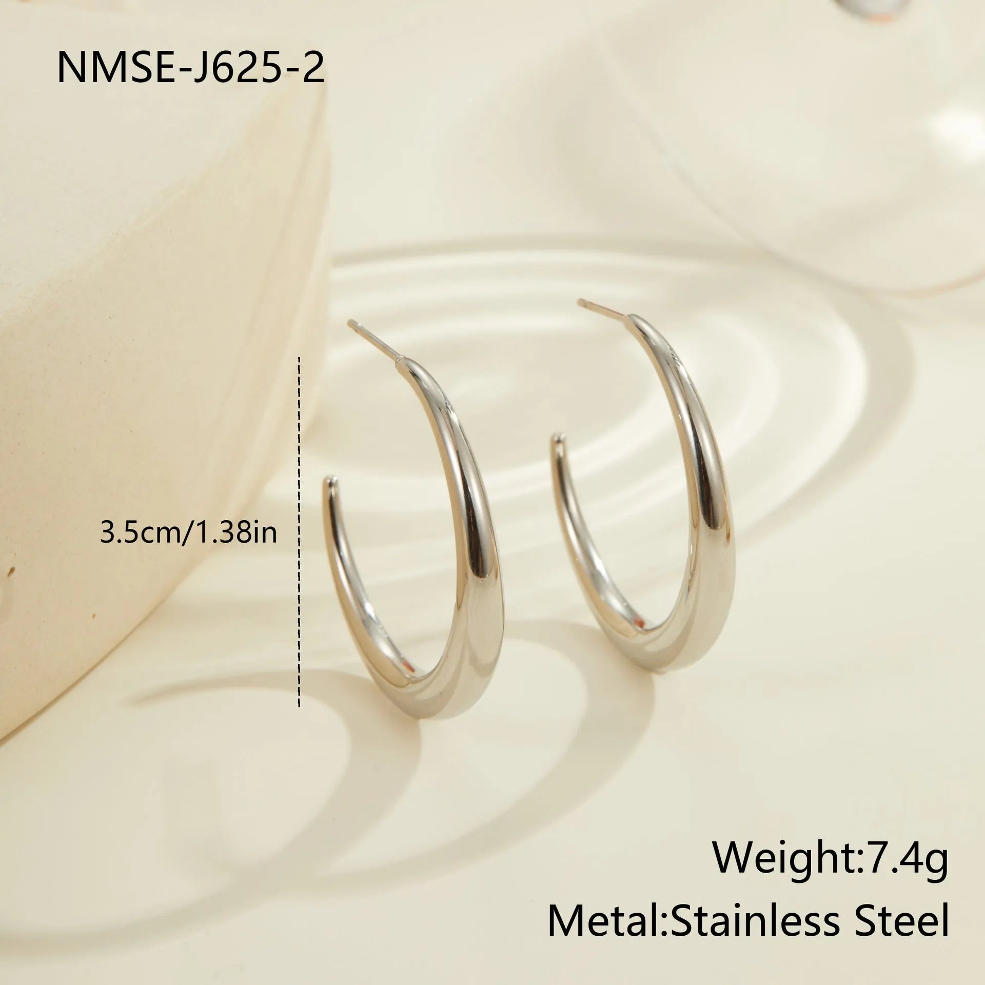 Titanium steel hoop earrings with geometric round design in gold and steel finish options