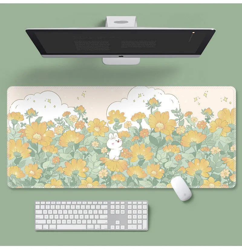 Floral pattern mouse pad on desk with keyboard, showing non-slip rubber base and colourful flower design