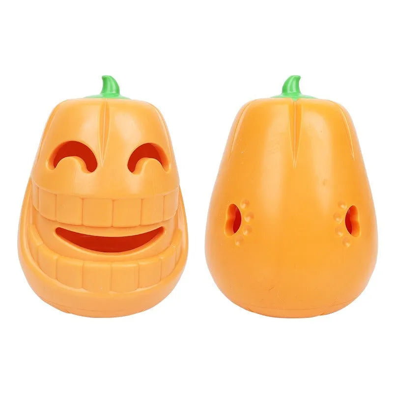 Orange Halloween pumpkin shaped interactive dog chew toy made of thermoplastic rubber with treat dispensing funnel design for all breed sizes