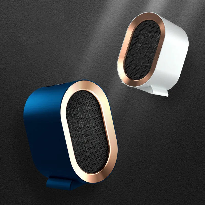 Desktop electric ceramic heater in various colours with mechanical controls and compact portable design