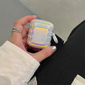 Silicone AirPod case with holographic laser design and metal ring for multiple AirPod models