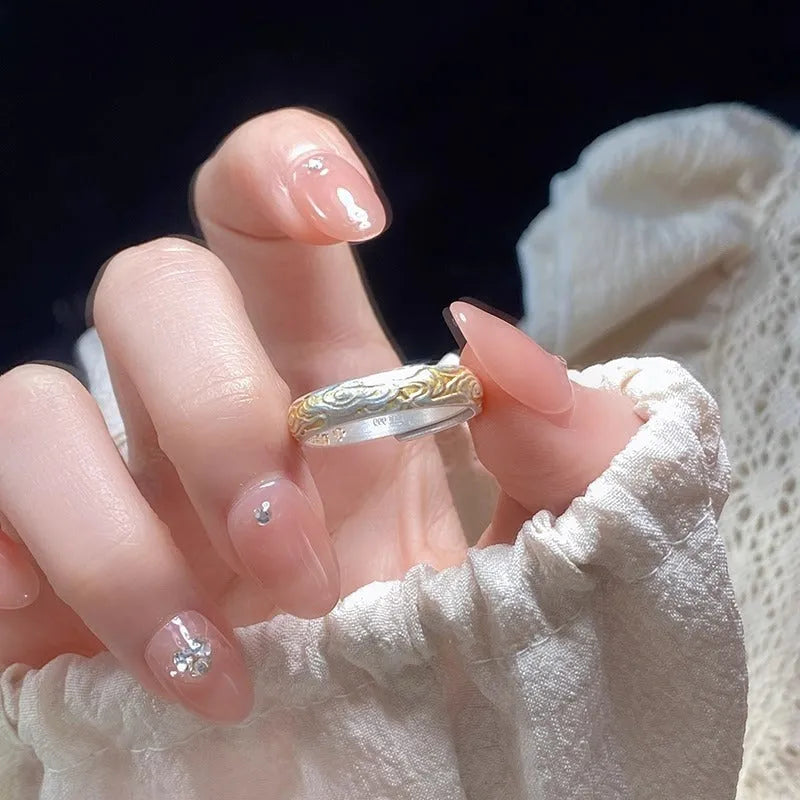 Xiangyun pattern white copper ring with silver gold electroplated finish and geometric open mouth design