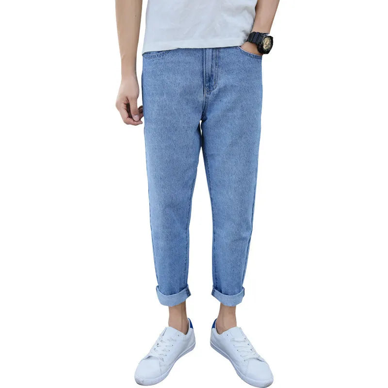Men's loose straight leg cotton jeans in black, showing relaxed fit and light straight leg opening.