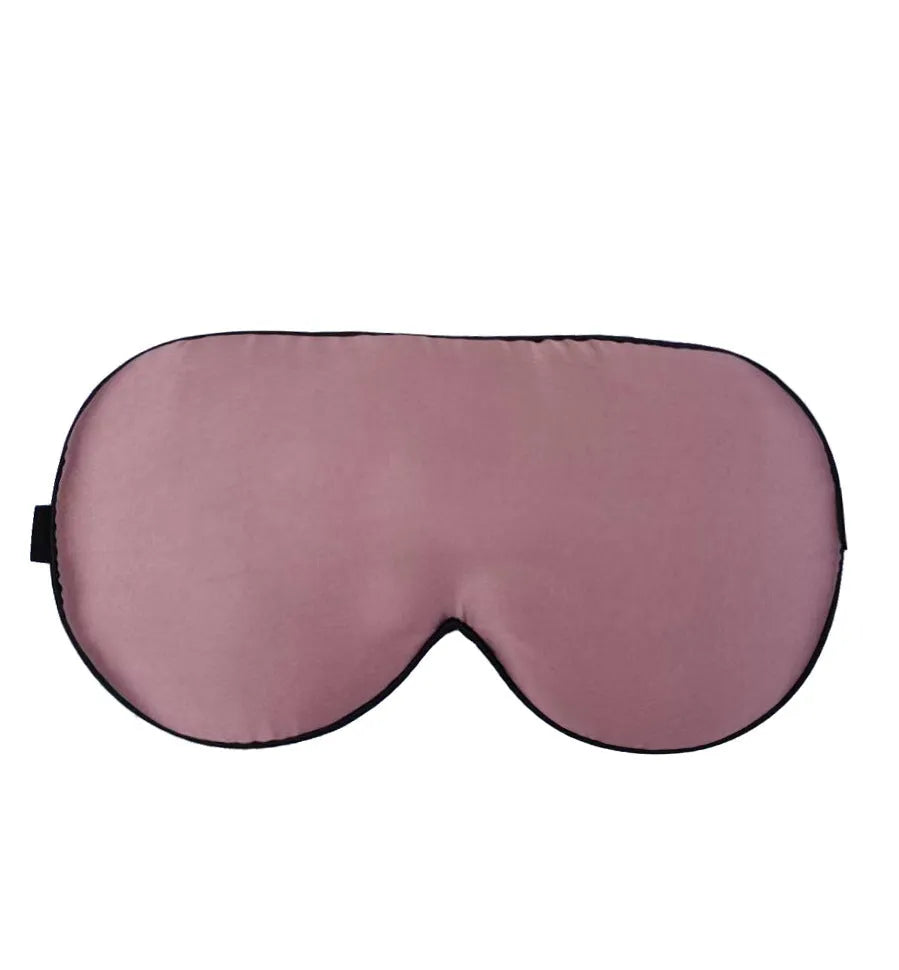 Double-sided mulberry silk sleep eye mask with embroidered printed pattern in various colours.