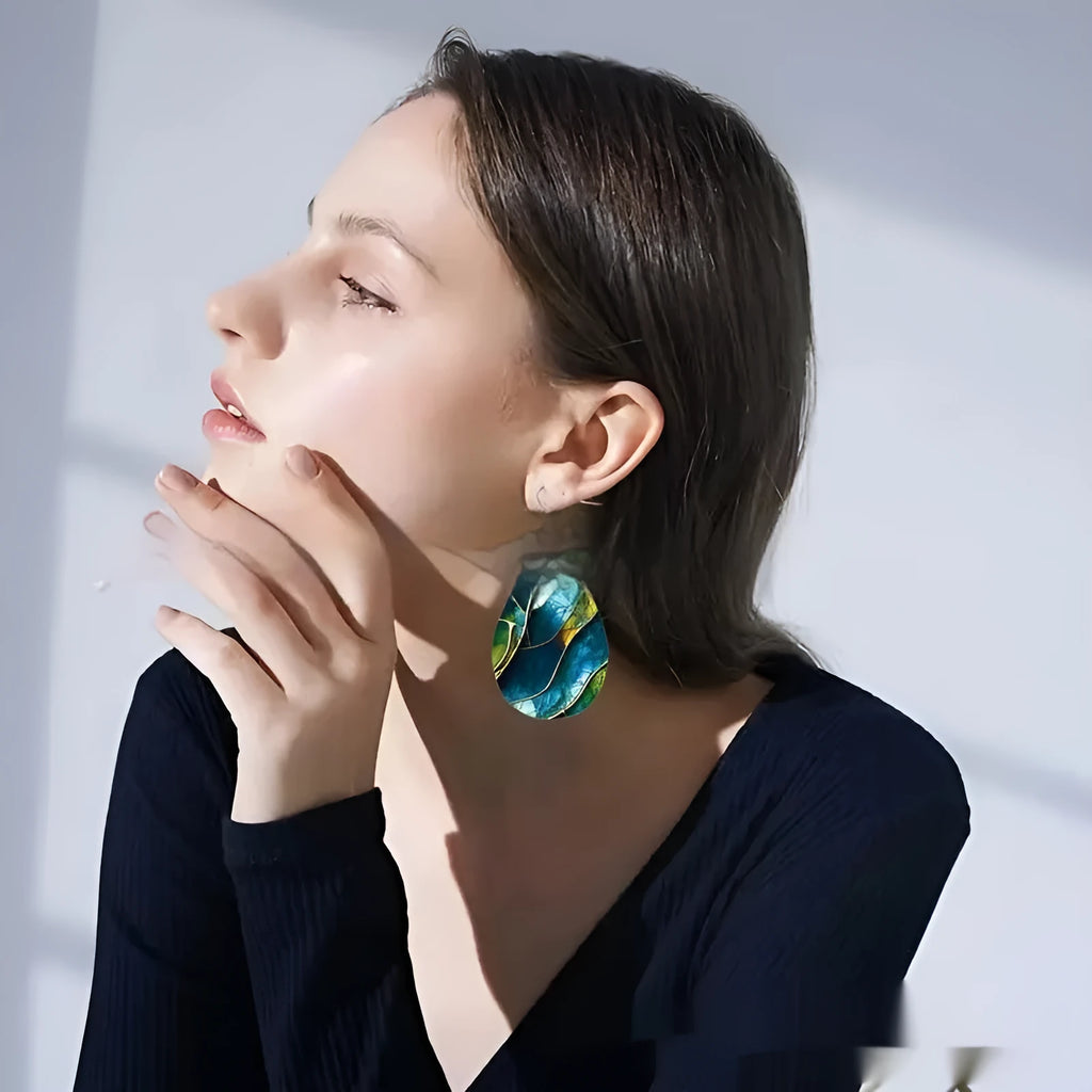 Pair of trendy acrylic flat branch knot drop earrings with printed design for unisex wear