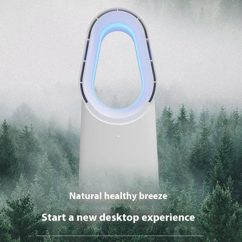 White bladeless tower floor fan with remote control on a wooden desk.