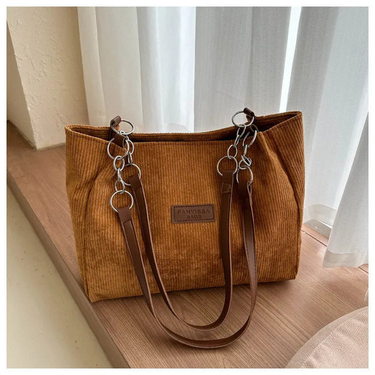 Corduroy one-shoulder tote handbag with three-dimensional pocket in street trend style