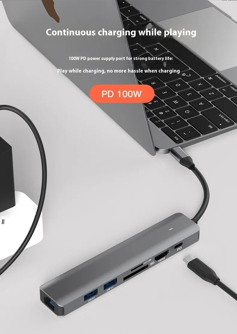 Silver LQT-LH07 7-in-1 USB-C hub and card reader for laptops showing multiple ports.
