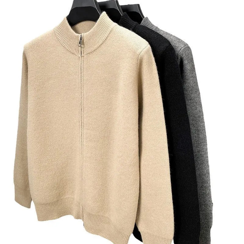 Man wearing a beige stand collar zip-front knitted cardigan with a loose fit.