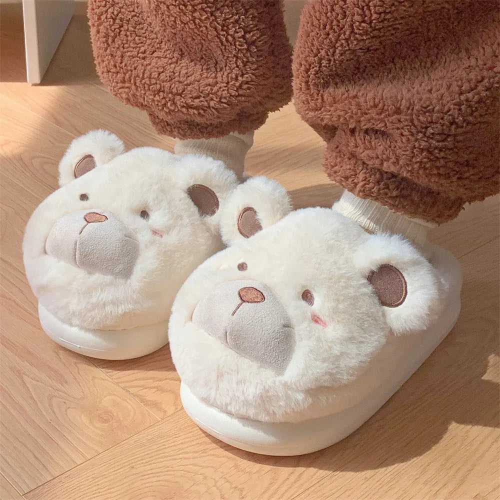 Women's cartoon patterned brown suede Baotou plush slippers with round toe.