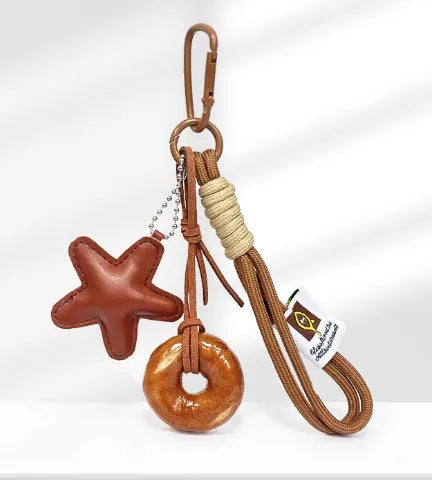 Brown five-pointed star handmade soda bread style handbag pendant with carrying strap