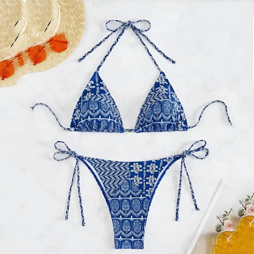 Women's green bandage style bikini with printed stitching on a briefs bottom.