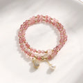 Women's strawberry quartz crystal bracelet with a geometry shape design.