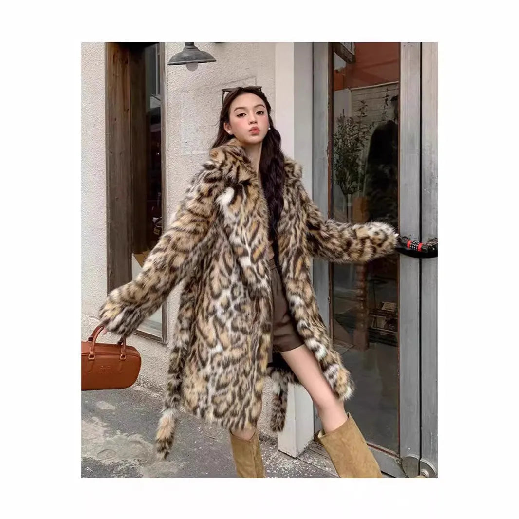 Long faux fur coat with fox print design, fur collar, and pockets in a street fashion style.