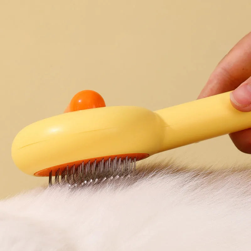 Small yellow duck decorative handle cat grooming comb with open section needle teeth for pet hair removal