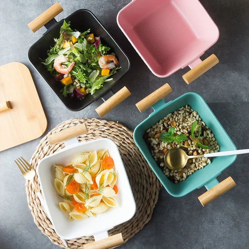 Modern ceramic bowl with irregular organic shape and coordinating lid in porcelain
