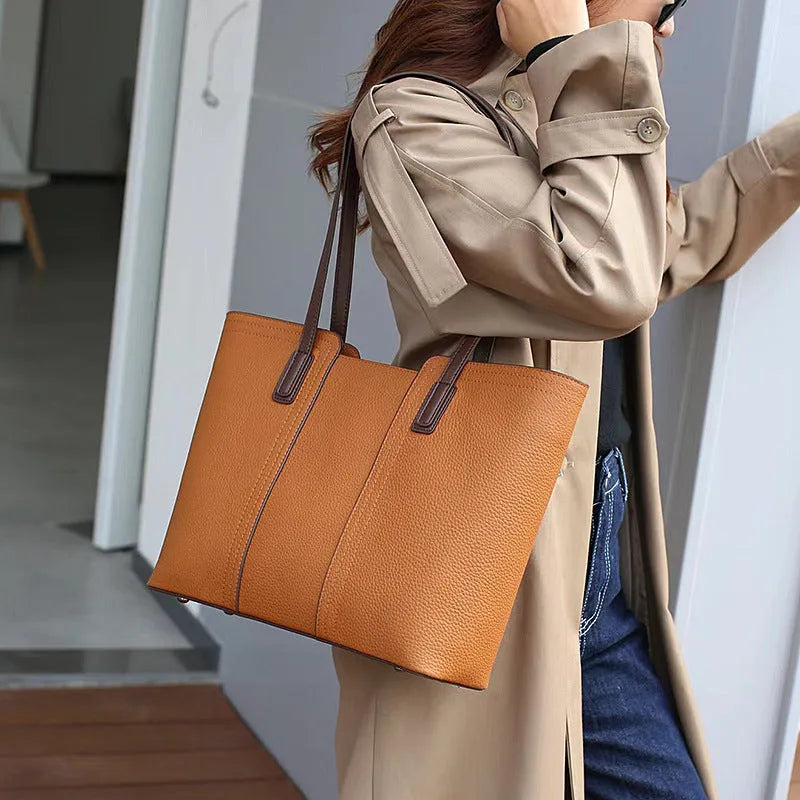 Women's genuine leather large capacity crossbody commuter bag with multiple internal compartments