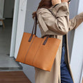 Women's genuine leather large capacity crossbody commuter bag with multiple internal compartments
