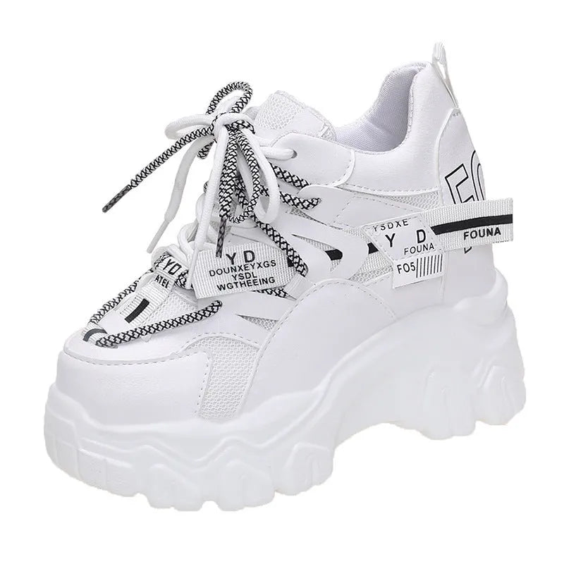 Women's white breathable mesh platform sports shoes with a cross strap and rubber sole.