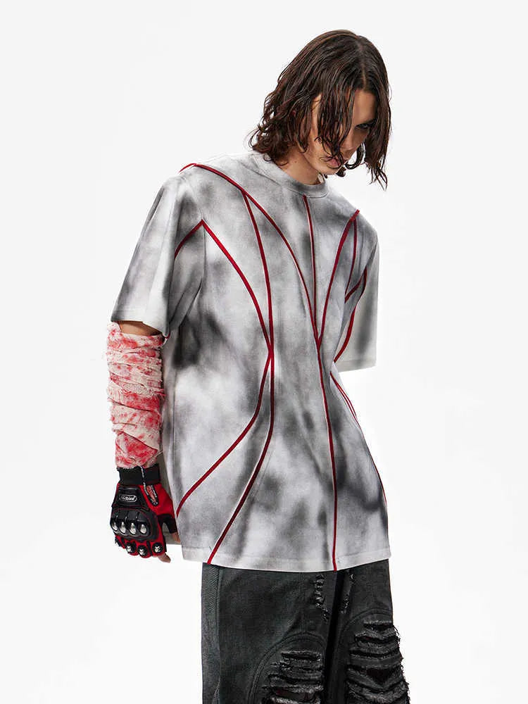 Men's T-shirt with padded shoulders and raised patchwork line detailing on front