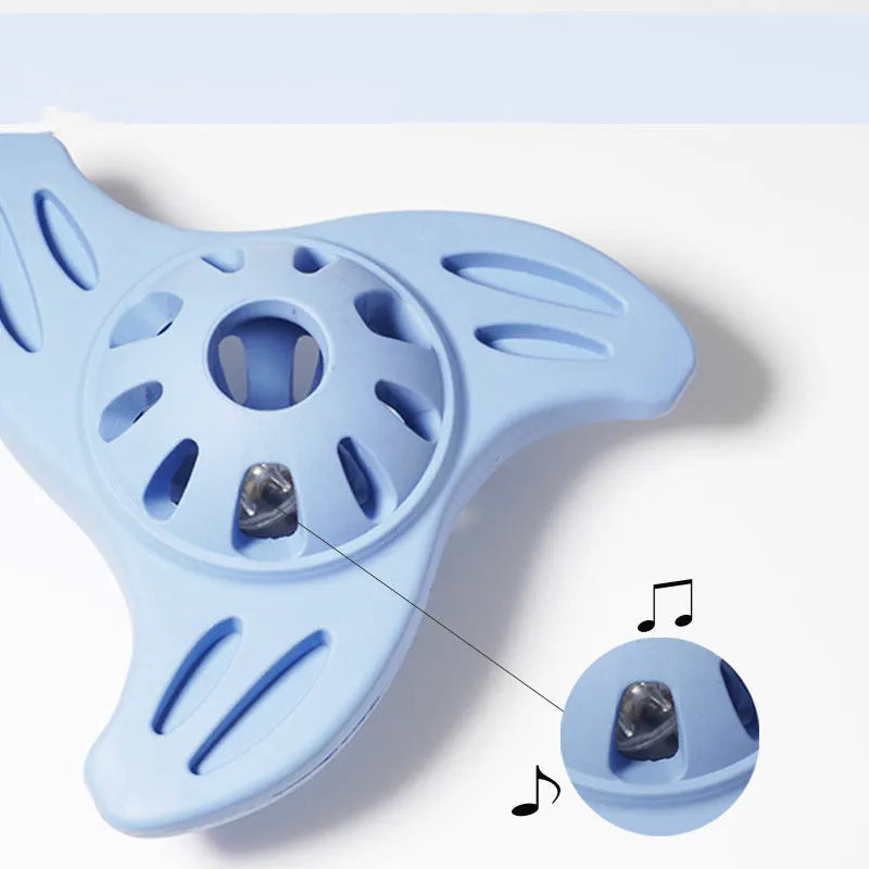Blue boomerang-shaped dog chew toy with molar-inspired edges for medium and large breeds