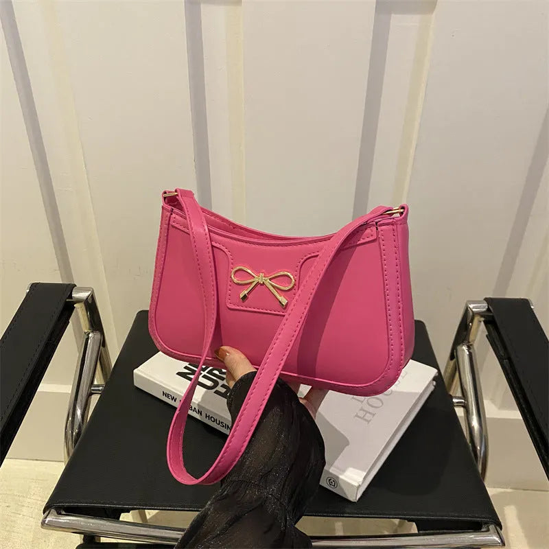 PU leather western style baguette shoulder bag with bow detail in horizontal square silhouette
