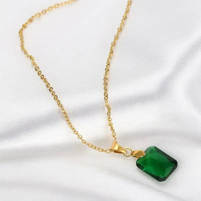 Copper rectangular geometric pendant necklace on O-ring chain in green colour.