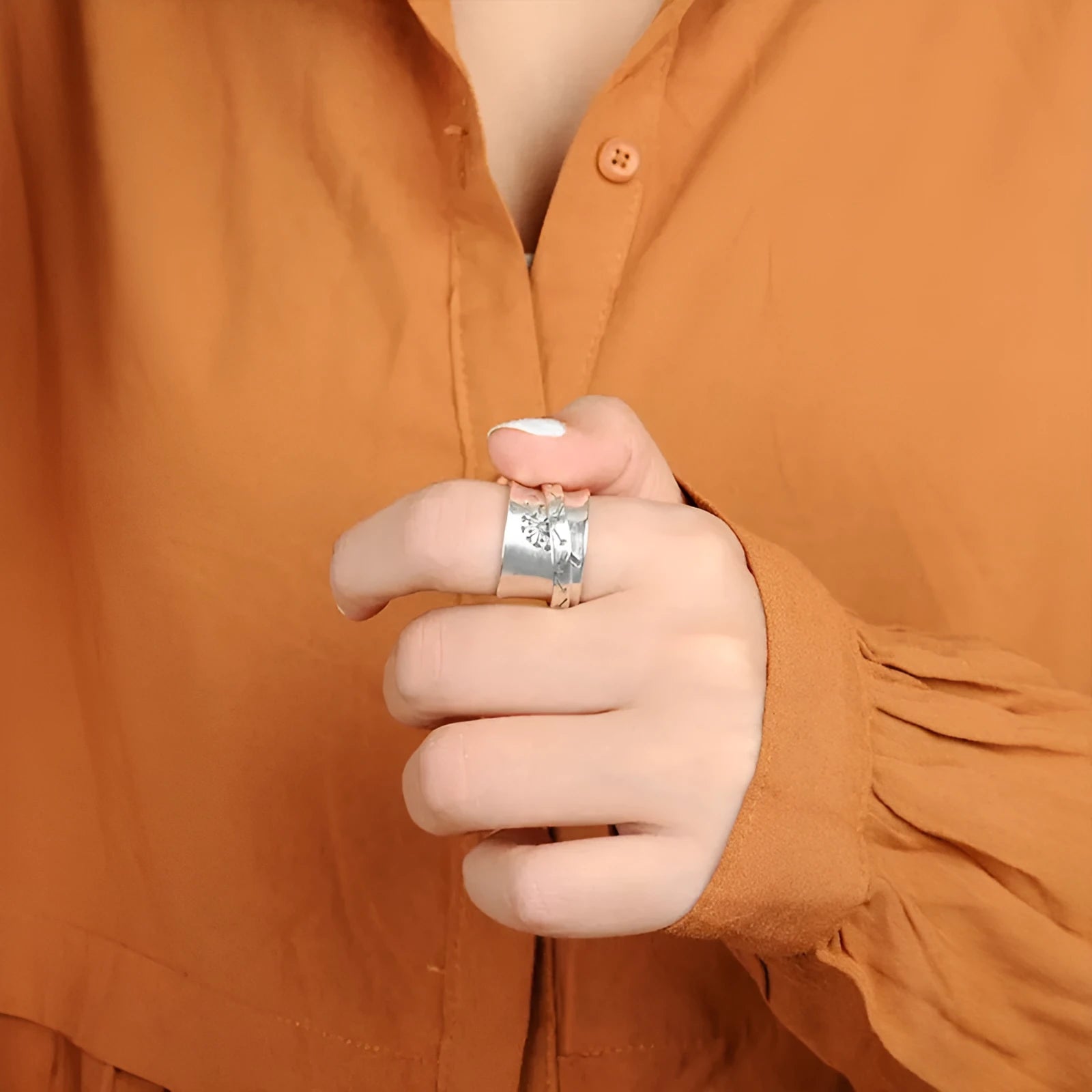 Silver electroplated flower fashion ring in alloy, available in sizes 7 through 11.