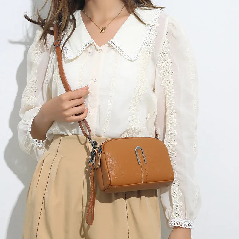 Genuine leather women's square shoulder bag in black, shown with dimensions 19x13x6 cm.