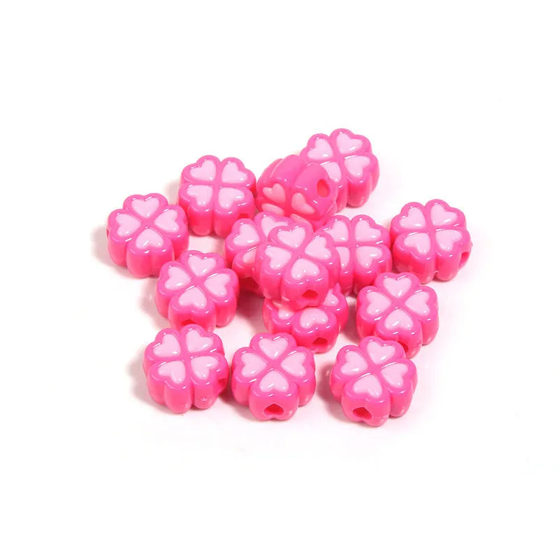 Acrylic four-leaf clover love beads with frosted finish in assorted light colours, 15mm size