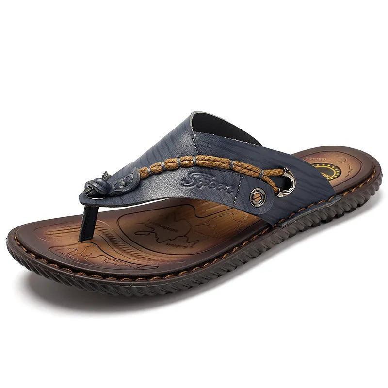 Men's casual non-slip slippers in blue with PU leather uppers, shown on a foot.