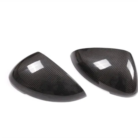Black carbon fibre rearview mirror covers for Porsche Macan with woven texture detail