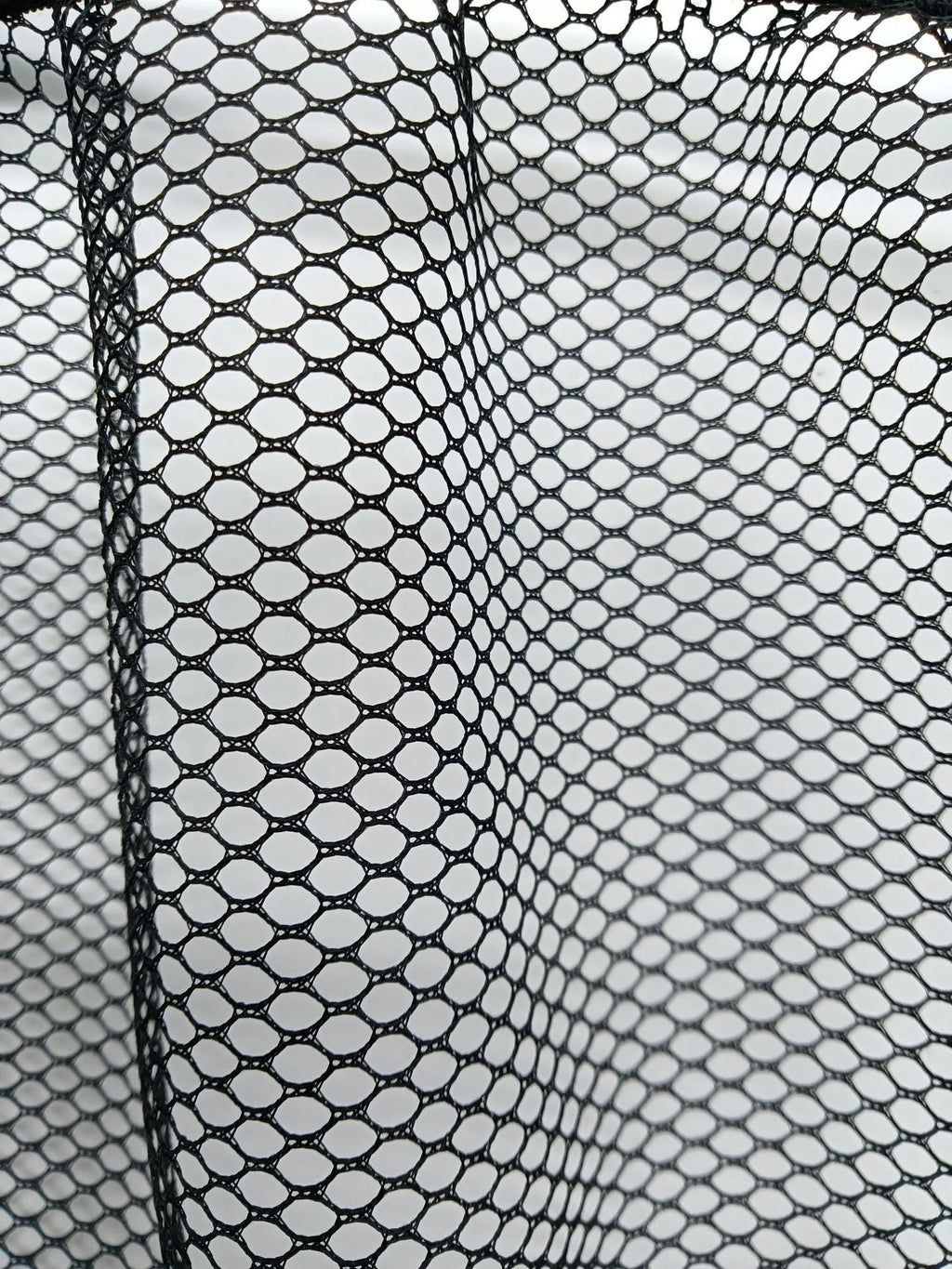 Elastic polyester storage net for car boot organisation in two size options.