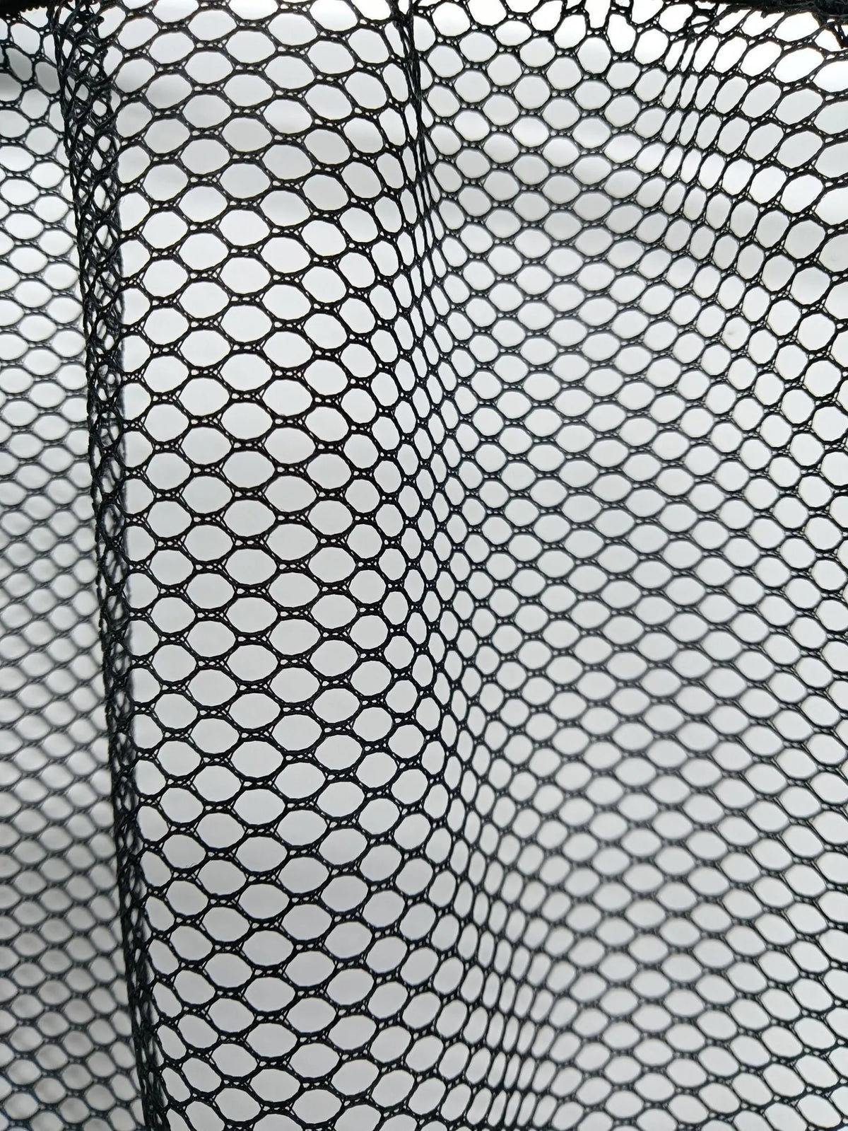 Elastic polyester storage net for car boot organisation in two size options.