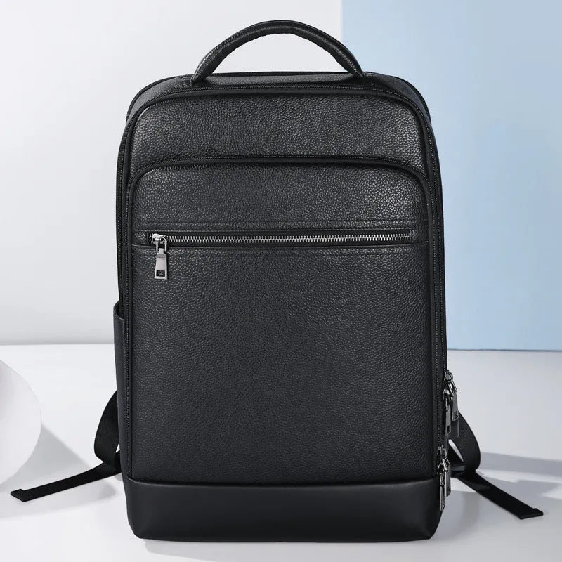 Black genuine leather men's business backpack with curved straps and a professional design.