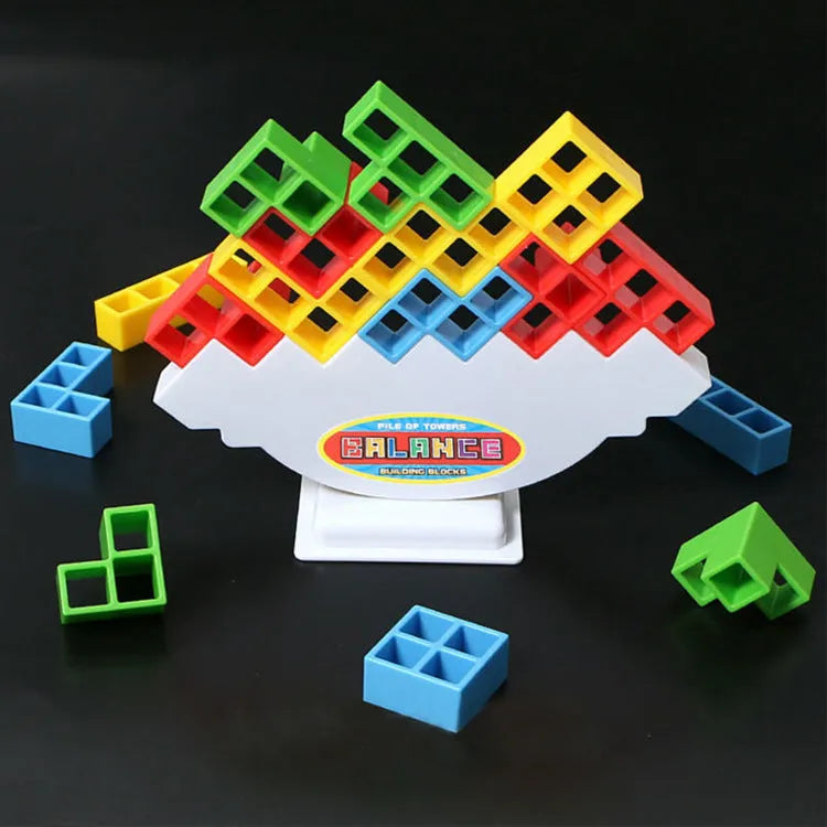 Plastic balance stacking board game with 16 colourful blocks on chassis and base