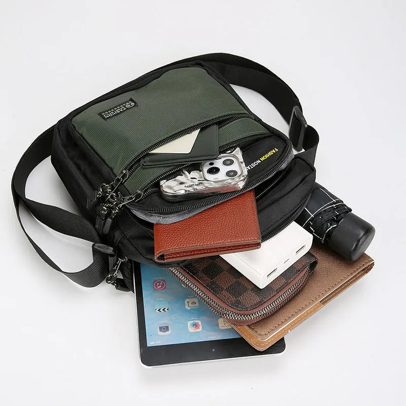 Men's crossbody bag in waterproof nylon with urban style and sewing thread details