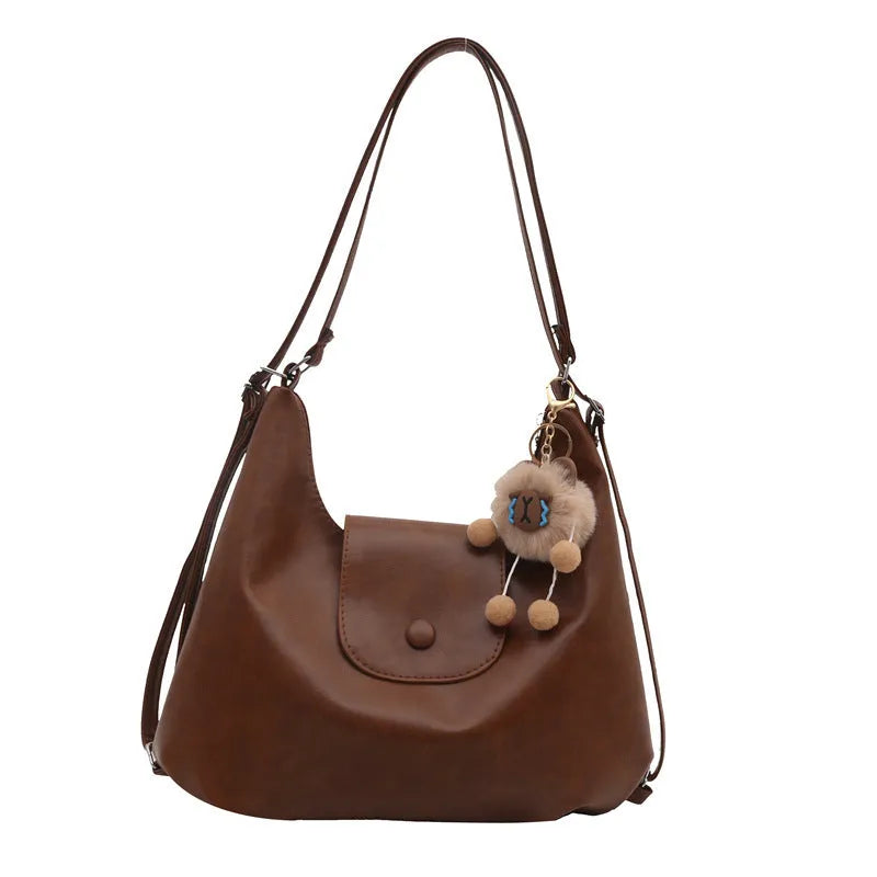 Women's PU leather shoulder bag in horizontal square shape with single strap and mobile phone compartment