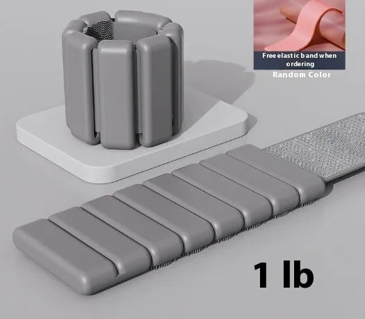 Silicone fitness weight bracelet with Velcro strap shown in black, blue, grey, or pink.