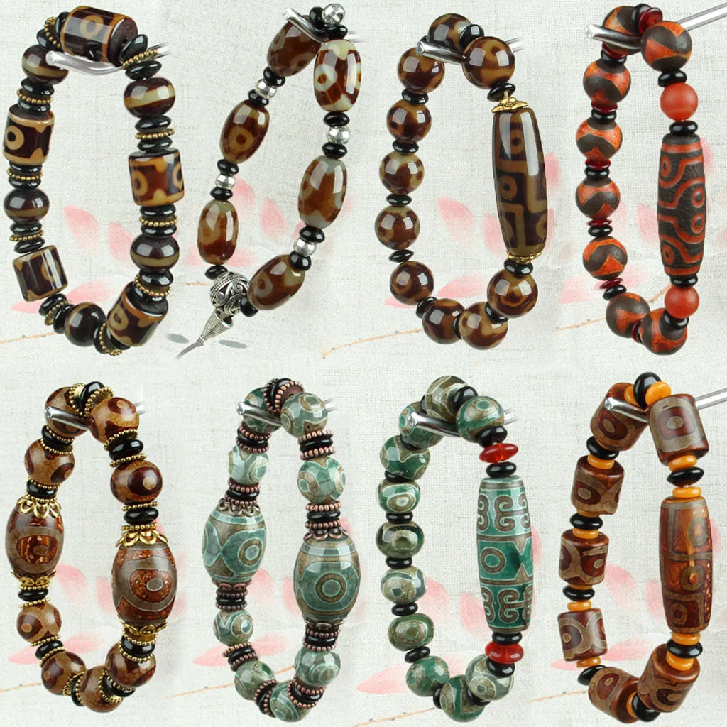 Distressed agate bracelet with traditional Tibetan dzi beads including three-eye and Nine Eyes designs.