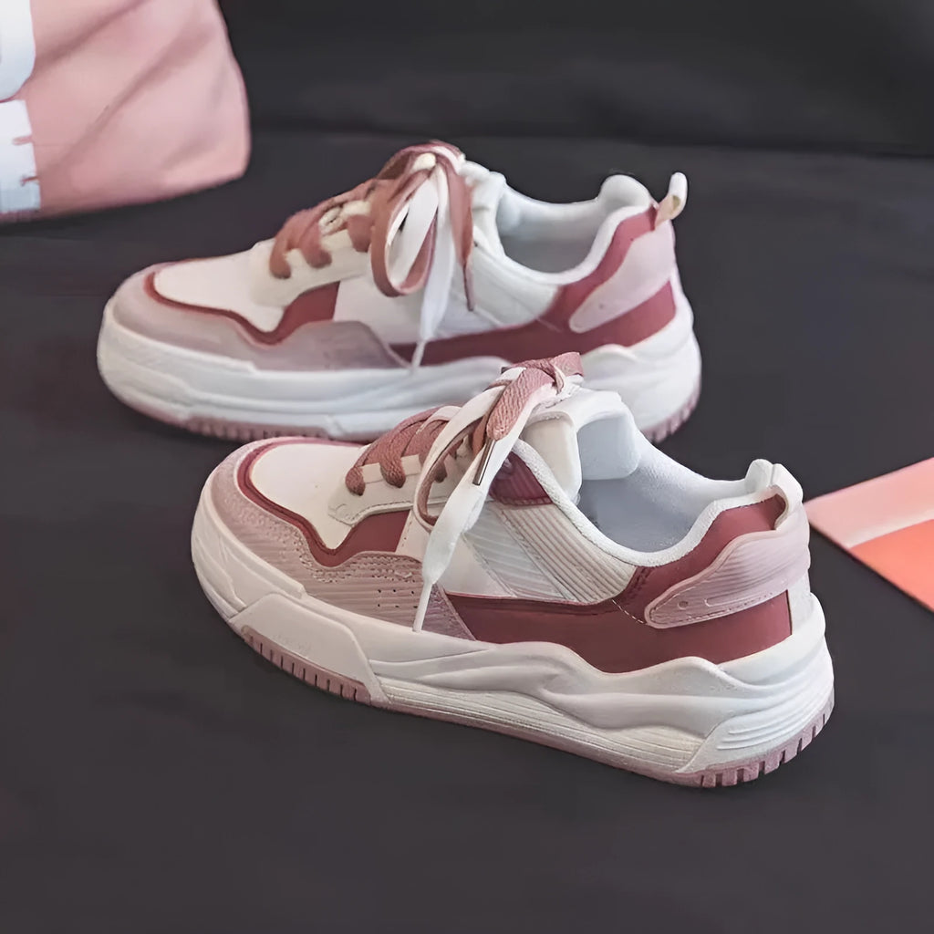 Low top rubber sneaker in pink or milky white with height increasing sole and breathable design