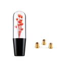 15cm transparent crystal car gear head with water flower design, shown with three metal adapters.
