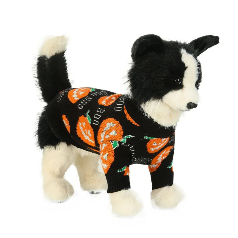 Black Halloween dog sweater with orange pumpkin pattern shown on model dog